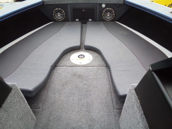 Slide: The Image of Interior of 2022 Alumacraft Edge 175 Sport boat with cushioned seating and speakers. - 12