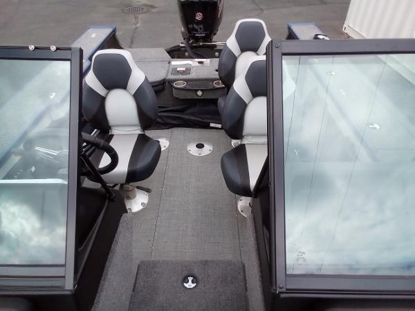Slide: The Image of 2022 Alumacraft Edge 175 Sport boat interior with seating and windshield. - 13
