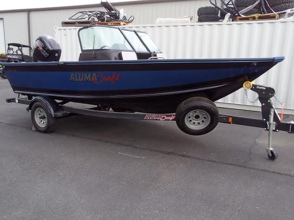 Slide: The Image of 2022 Alumacraft Edge 175 Sport boat on a trailer, parked outdoors. - 3