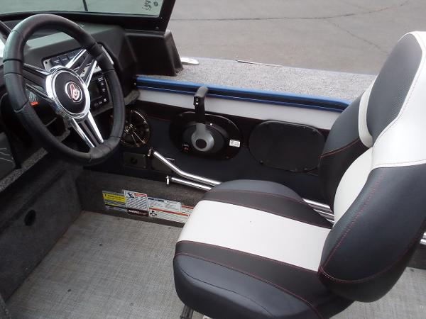 Slide: The Image of 2022 Alumacraft Edge 175 Sport boat interior with steering wheel and captain's seat. - 7