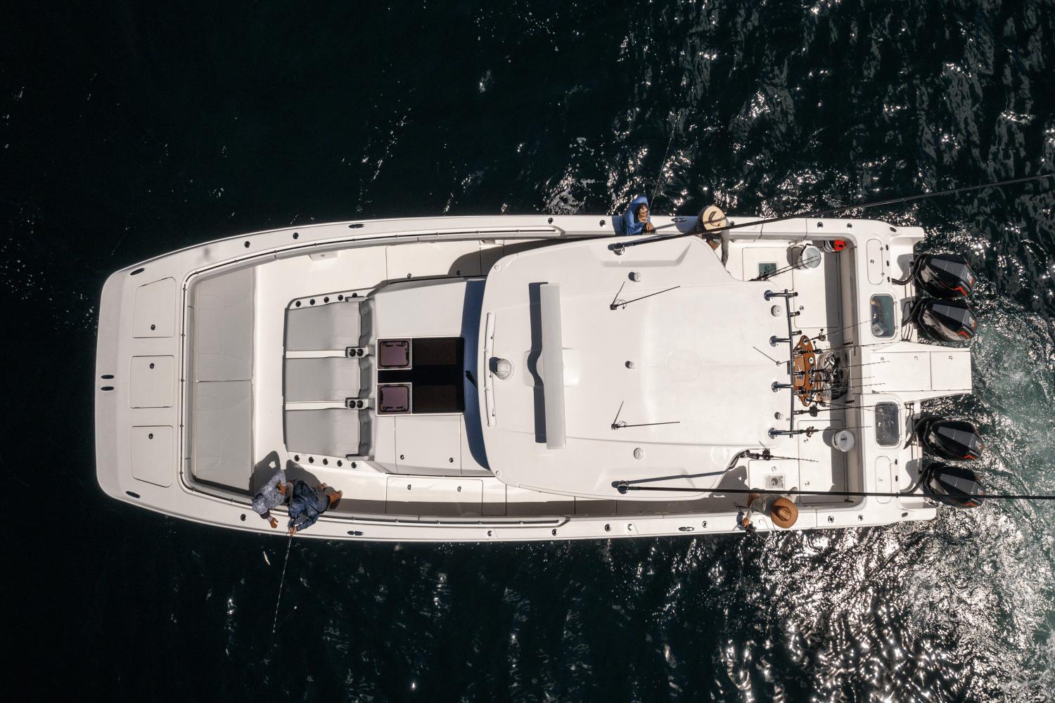 Slide: The Image of Aerial view of 2024 Aquila 47 Molokai boat on water. - 14