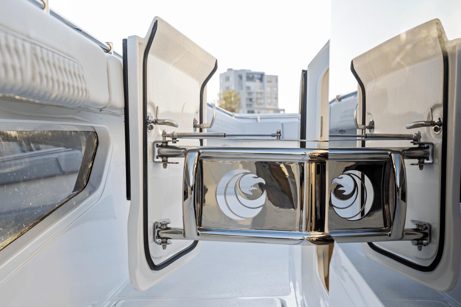 Slide: The Image of Aquila 47 Molokai 2024 yacht's sleek stainless steel and white interior details. - 8