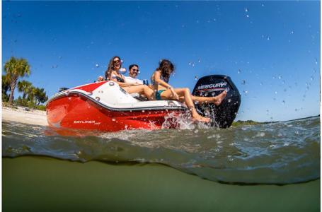 Slide: The Image of 2024 Bayliner Element M19 boat with people enjoying the water. - 9