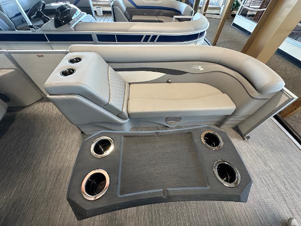 Slide: The Image of 2023 Bennington 22SSR boat interior with cushioned seating and cup holders. - 3