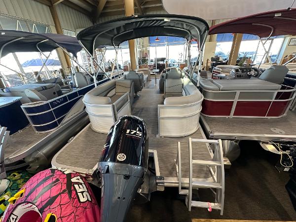 Slide: The Image of 2023 Bennington 22SSR pontoon boat with 175 HP engine in showroom. - 7