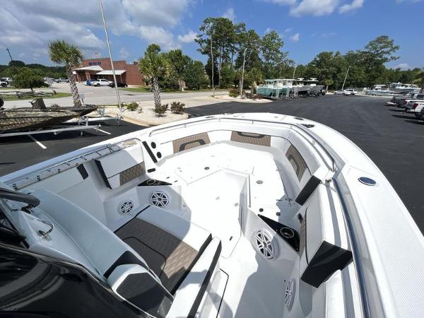 Slide: The Image of 2024 Blackfin 272 CC boat with spacious seating and modern design. - 10