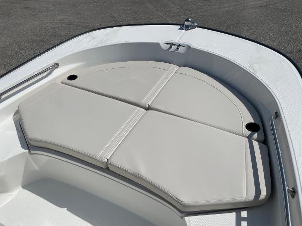 Slide: The Image of 2023 Boston Whaler 210 Montauk bow seating area with cushioned pads. - 10