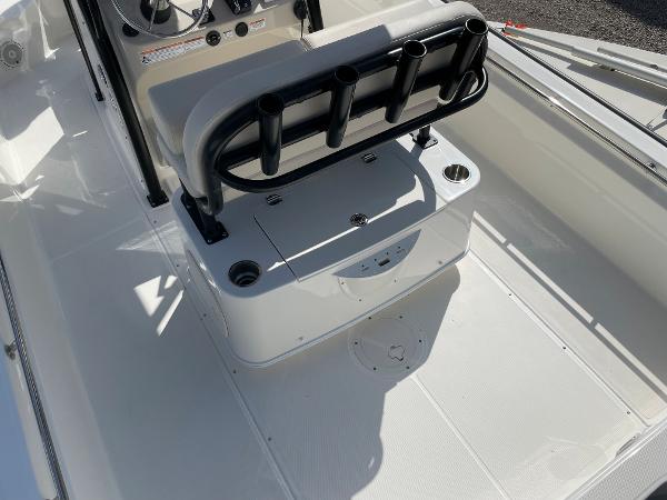 Slide: The Image of 2023 Boston Whaler 210 Montauk boat interior with seating and rod holders. - 3