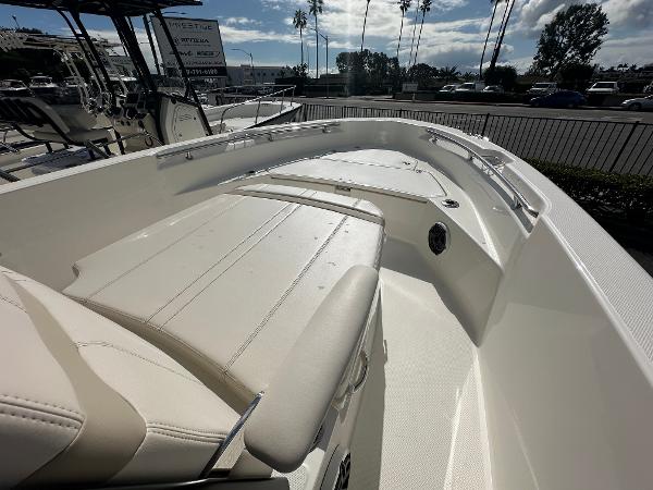 Slide: The Image of 2024 Boston Whaler 220 Dauntless boat interior, front seating area. - 9