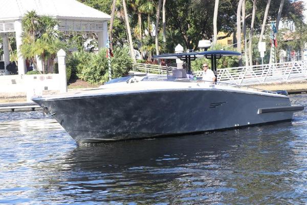 Slide: The Image of 2018 Canados Gladiator 428 luxury yacht cruising on a sunny day. - 1