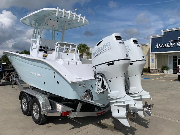 Slide: The Image of 2024 Cape Horn 24 XS boat with twin Suzuki engines on a trailer. - 1