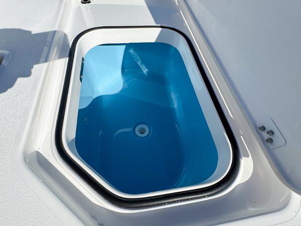 Slide: The Image of 2024 Caymas 28 HB boat livewell with blue interior. - 13