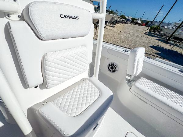 Slide: The Image of 2024 Caymas 28 HB boat interior with white quilted seating. - 23