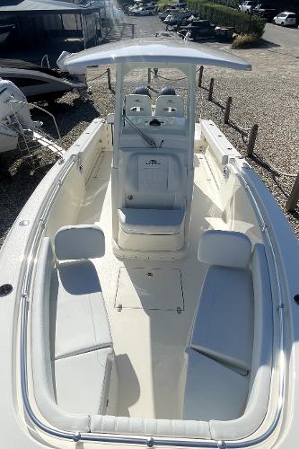 Slide: The Image of 2024 Cobia 262cc center console boat with spacious seating and modern design. - 14