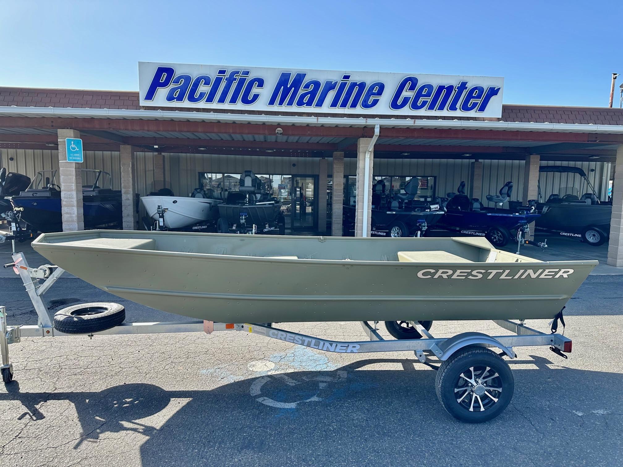 Slide: The Image of 2024 Crestliner 1448M boat on trailer at Pacific Marine Center. - 1