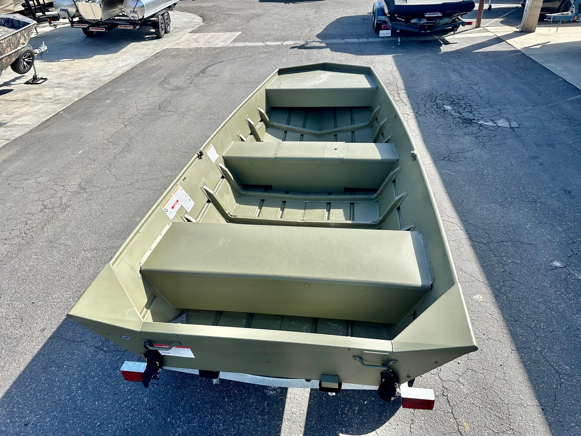 Slide: The Image of 2024 Crestliner 1448M aluminum boat on trailer in parking lot. - 8