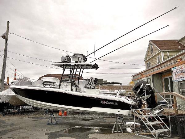 Slide: The Image of 2023 Crevalle 26 HBW boat displayed outdoors. - 1