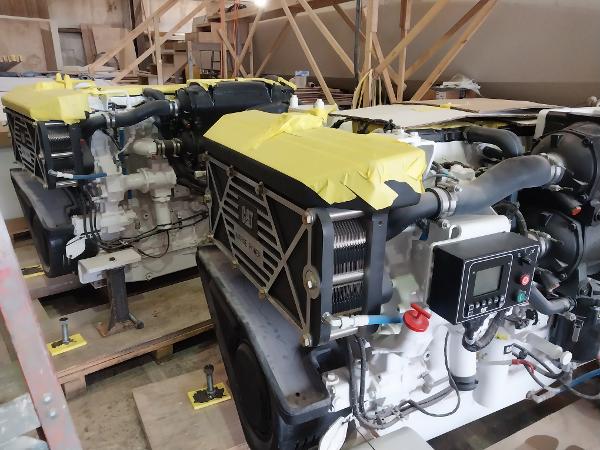 Slide: The Image of Custom Carolina 63 2024 boat engines in a workshop. - 4