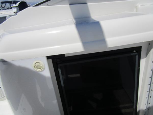 Slide: The Image of 2000 Formula 280 SS boat cabin entrance with white exterior. - 10