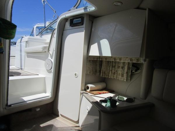 Slide: The Image of Interior cabin of a 2000 Formula 280 SS boat with open door and sunlight. - 13