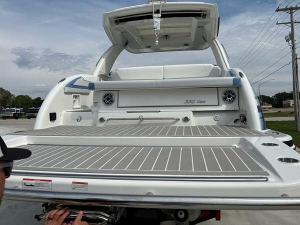 Slide: The Image of 2023 Formula 350 CBR boat, rear view, showcasing spacious deck and modern design. - 11