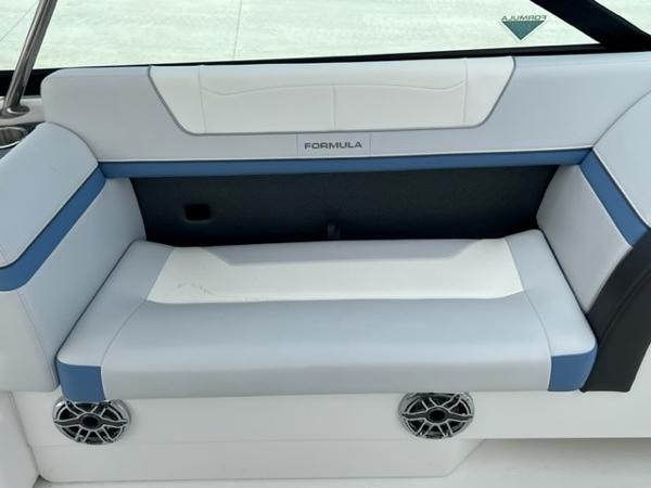 Slide: The Image of 2023 Formula 350 CBR boat interior with white and blue seating. - 7