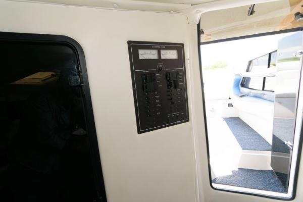 Slide: The Image of Electrical panel inside a 1991 Fountain 38 Sport Cruiser boat. - 15