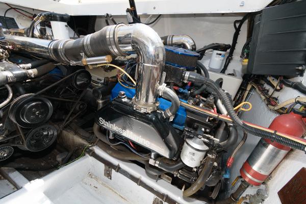 Slide: The Image of Engine compartment of a 1991 Fountain 38 Sport Cruiser boat. - 18