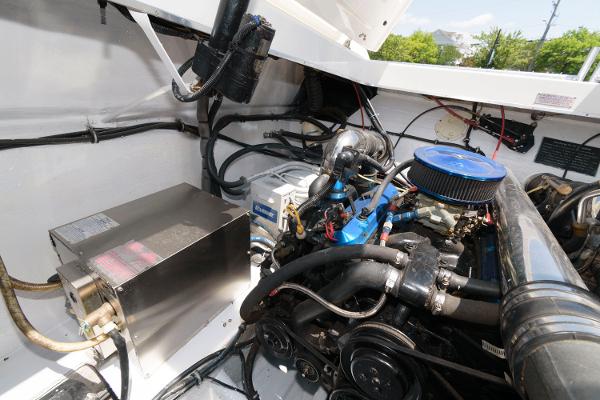 Slide: The Image of 1991 Fountain 38 Sport Cruiser engine compartment with visible components and wiring. - 19