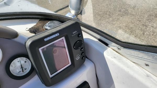 Slide: The Image of Humminbird fish finder on 1996 Four Winns 190 Horizon Bowrider dashboard. - 11