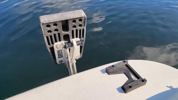 Slide: The Image of 1996 Four Winns 190 Horizon Bowrider boat part over water. - 20