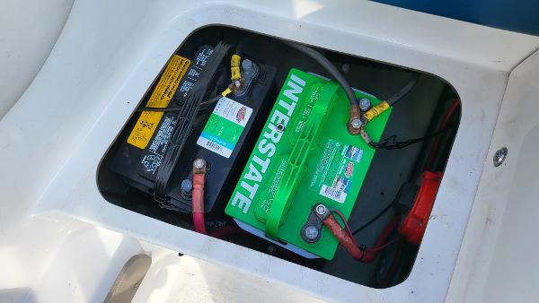 Slide: The Image of 1996 Four Winns 190 Horizon Bowrider battery compartment with Interstate battery. - 23