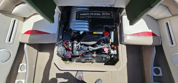 Slide: The Image of 1996 Four Winns 190 Horizon DLX boat engine compartment with Volvo Penta engine. - 13