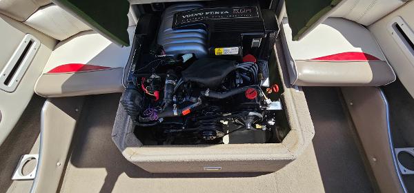 Slide: The Image of 1996 Four Winns 190 Horizon DLX boat engine compartment with Volvo Penta engine. - 14