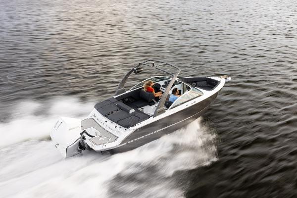 Slide: The Image of 2023 Four Winns H2 OB boat cruising on water. - 0