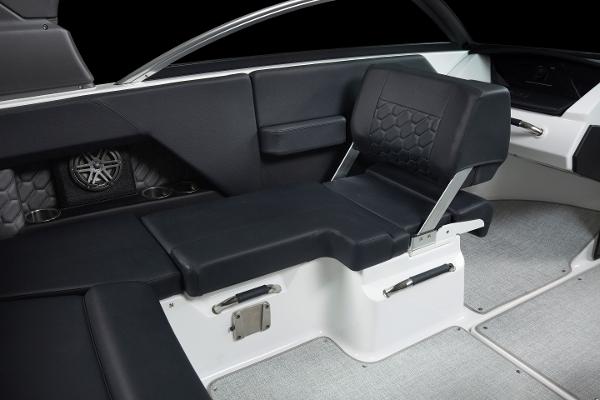 Slide: The Image of 2023 Four Winns H2 OB boat interior with black seating and modern design. - 18