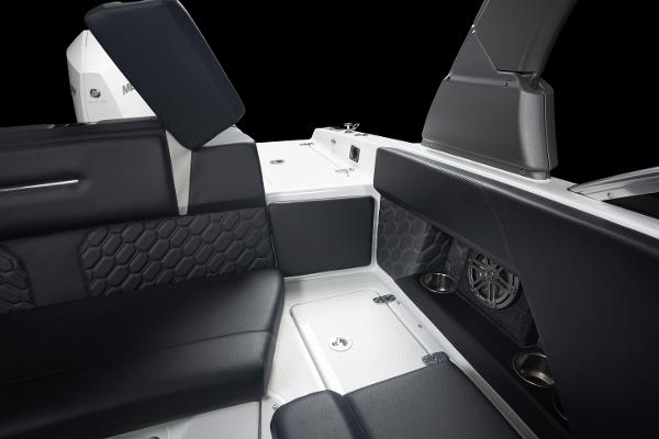 Slide: The Image of 2023 Four Winns H2 OB boat interior with black leather seats and modern design. - 20