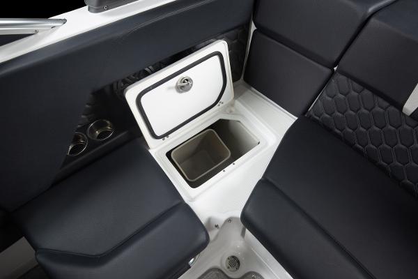 Slide: The Image of 2023 Four Winns H2 OB boat interior with storage compartment and black seating. - 22