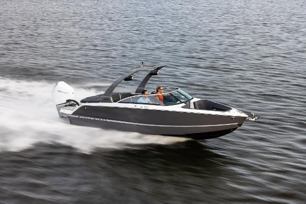 Slide: The Image of 2023 Four Winns H2 OB speedboat cruising on water. - 3