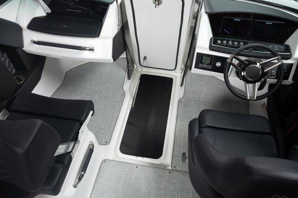 Slide: The Image of 2023 Four Winns H2 OB boat interior with modern seating and steering console. - 32
