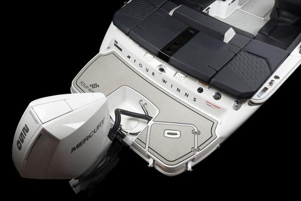 Slide: The Image of 2023 Four Winns H2 OB boat with Mercury outboard motor, rear deck view. - 34
