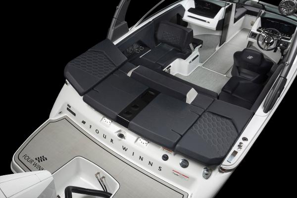 Slide: The Image of 2023 Four Winns H2 OB boat interior with seating and dashboard. - 35