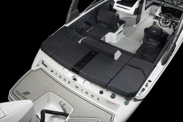 Slide: The Image of 2023 Four Winns H2 OB boat interior with black seating and modern design. - 36