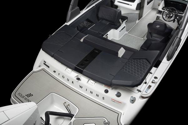 Slide: The Image of 2023 Four Winns H2 OB boat interior with black seating and modern design. - 37
