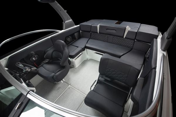 Slide: The Image of 2023 Four Winns H2 OB boat interior with black seating and modern design. - 38