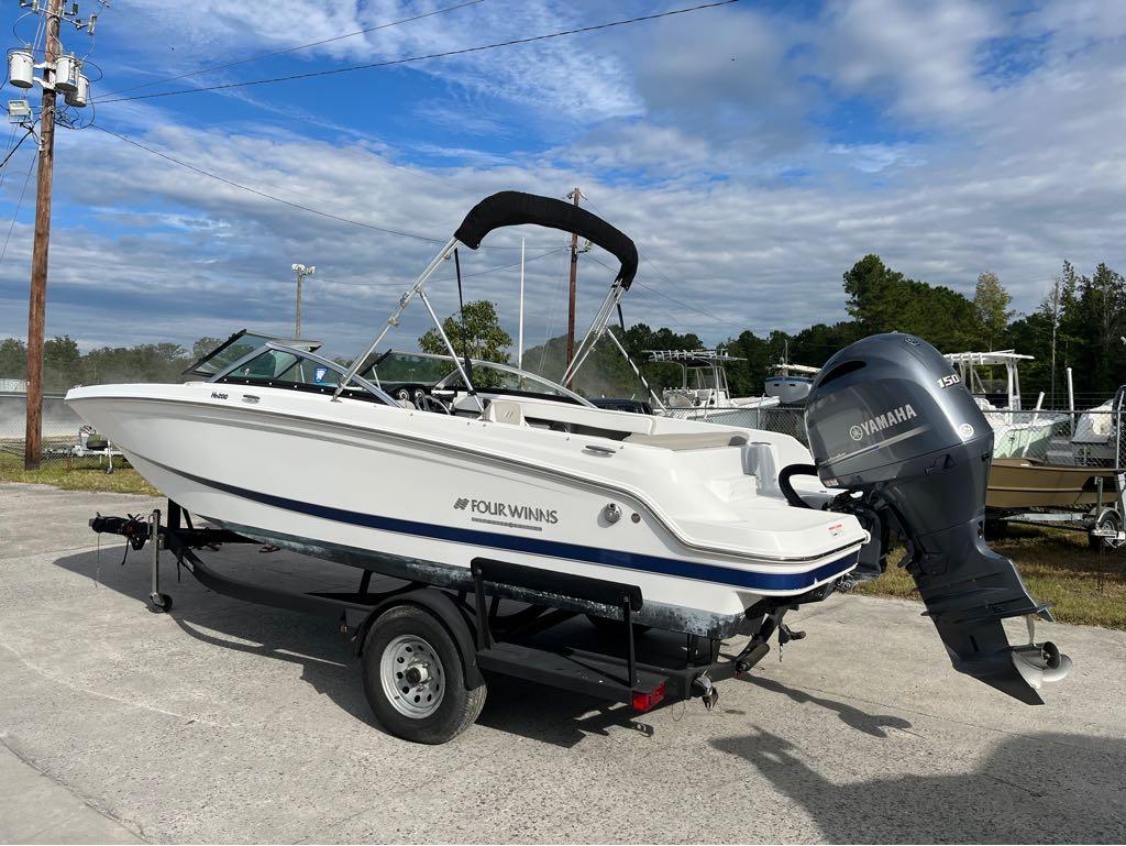 Slide: The Image of 2020 Four Winns HD 200 OB boat on trailer with Yamaha outboard motor. - 14