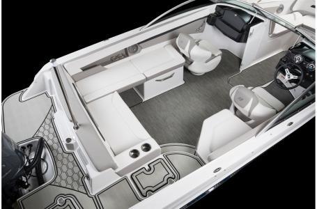 Slide: The Image of 2020 Four Winns HD 200 OB boat interior with seating and steering console. - 16