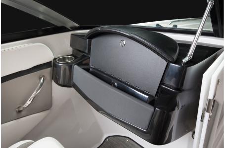 Slide: The Image of 2020 Four Winns HD 200 OB boat interior with glove compartment and cup holder. - 19