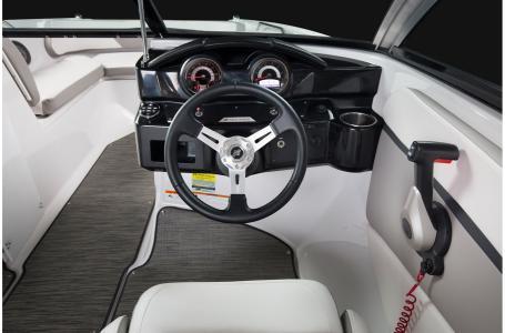 Slide: The Image of 2020 Four Winns HD 200 OB boat cockpit with steering wheel and dashboard. - 20