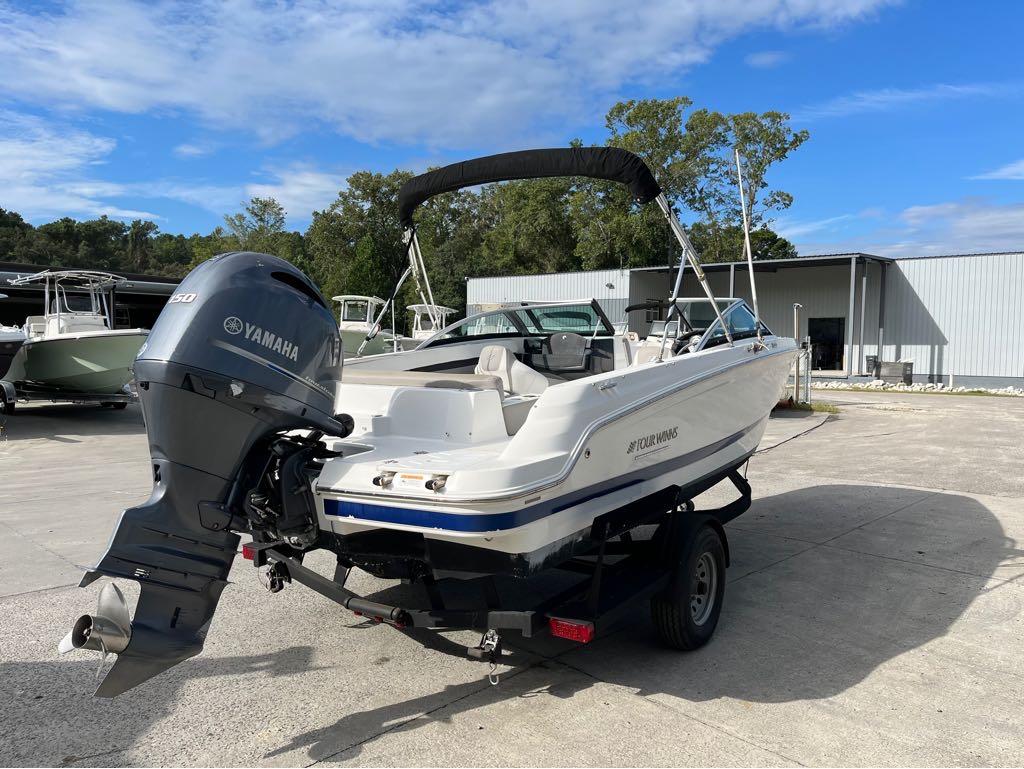 Slide: The Image of 2020 Four Winns HD 200 OB boat with Yamaha outboard motor on trailer. - 26